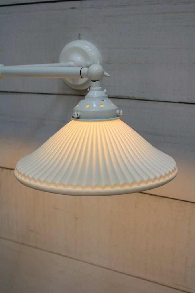 Double arm wall light with white finish and ceramic shades