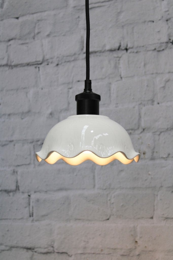 Frilled ceramic pendant with black cord