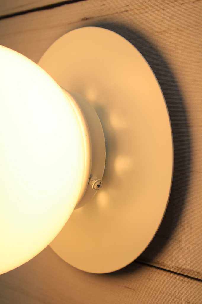 Glass Ball Disc Wall Light close up of opal shad with small white disc