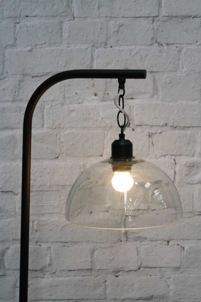 floor lamp with suspended glass dome shade