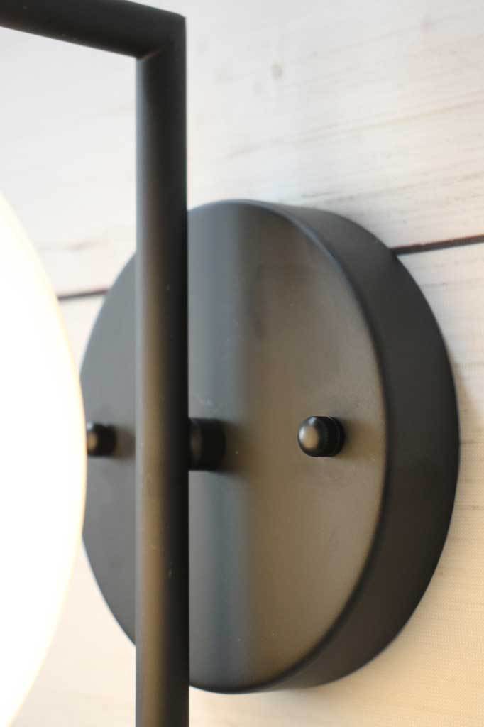 Opal glass wall light with matt black sconce