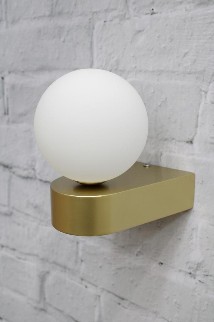 Gold and opal wall light unlit