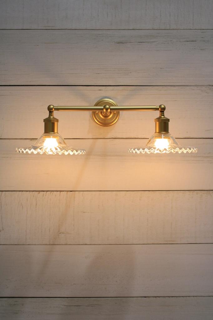 Gold wall light front view