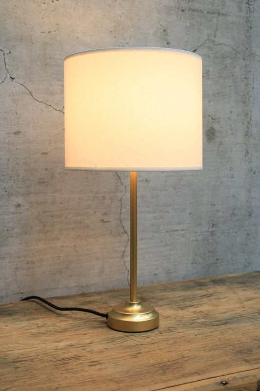 Gold table lamp with white fabric shade