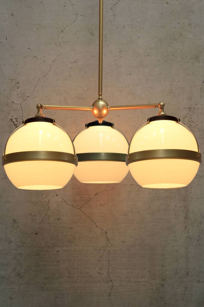 Huxley chandelier in gold with medium open shades