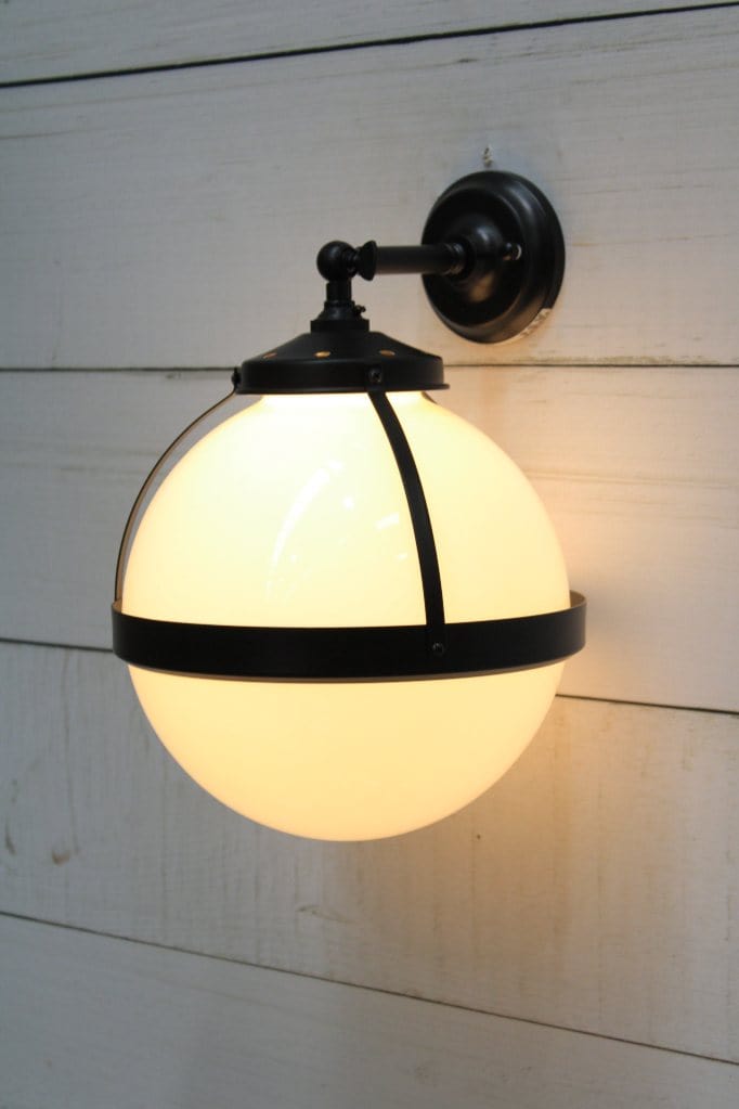 Huxley wall light with short black arm and medium opal shade