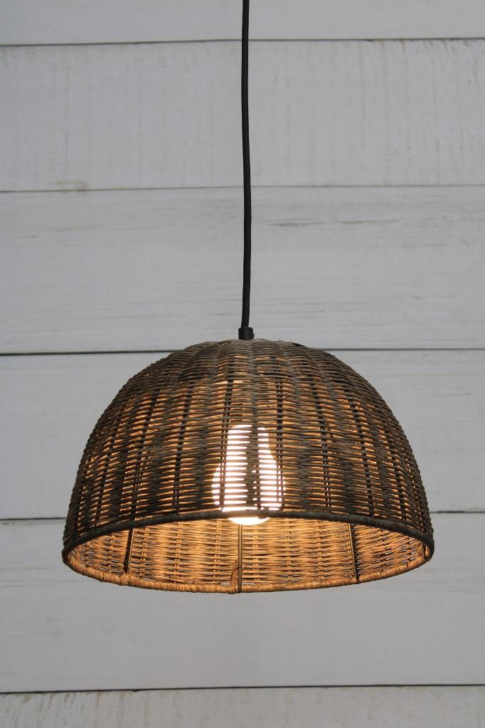  Rattan dome light in brown finish with black braided cord from lower angle