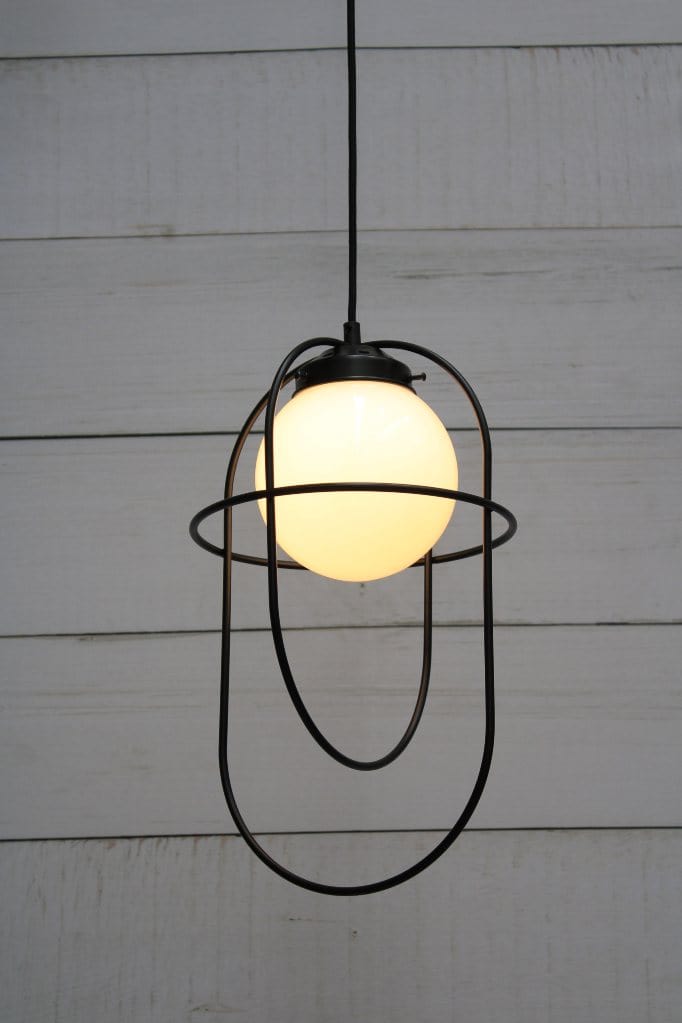 Pendant light with opal glass shade and matt black metalware