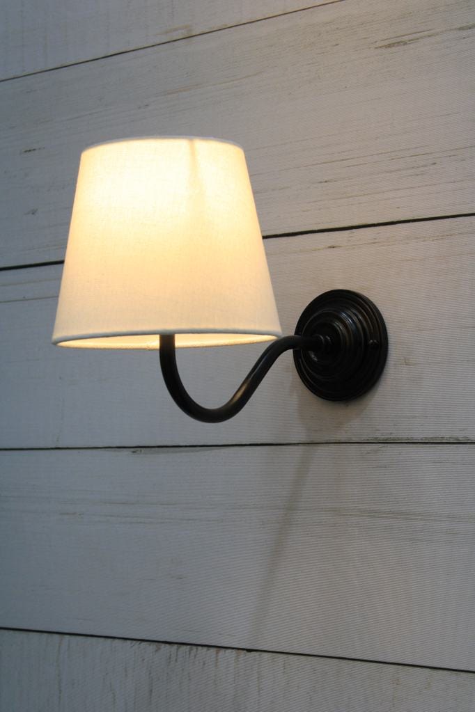 Black gooseneck wall light with white shade