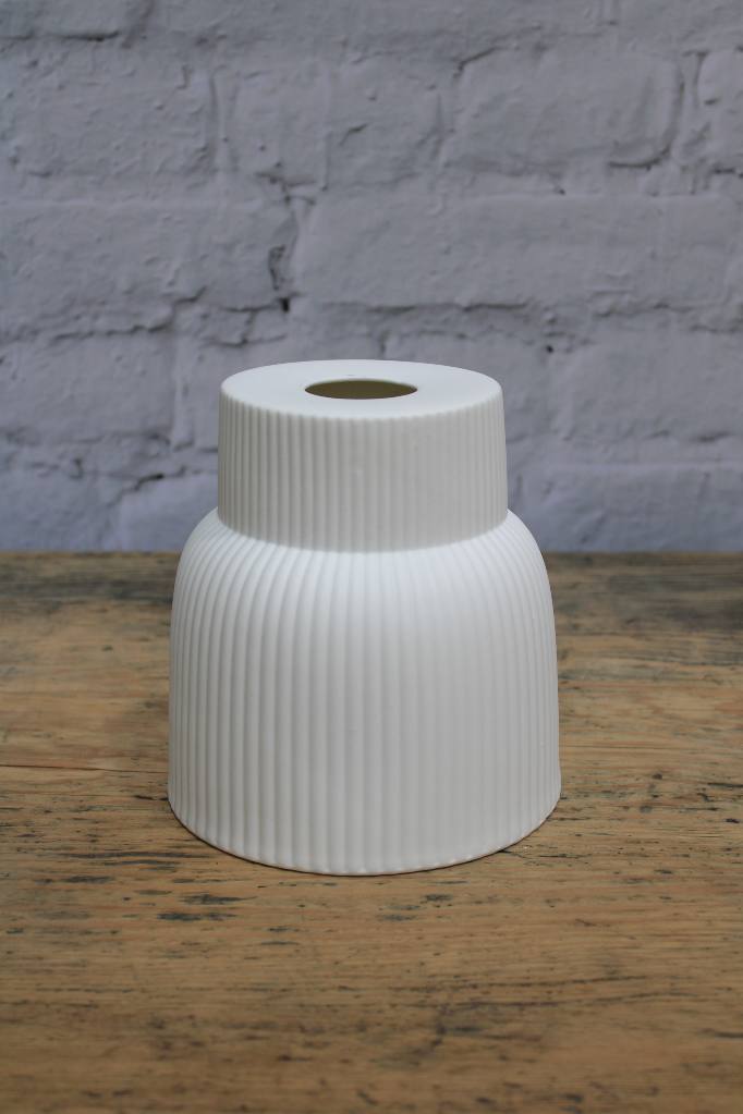 Ceramic wall light with unglazed, matt white finish