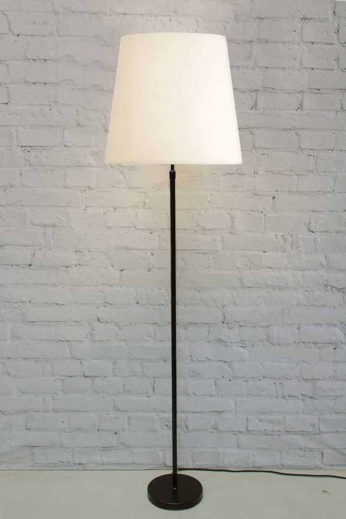 Melrose Tapered Shade Floor Lamp with black base and a natural shade