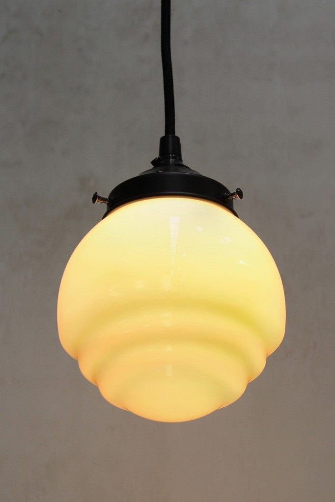 Miami pendant with round black cord and bright cool bulb