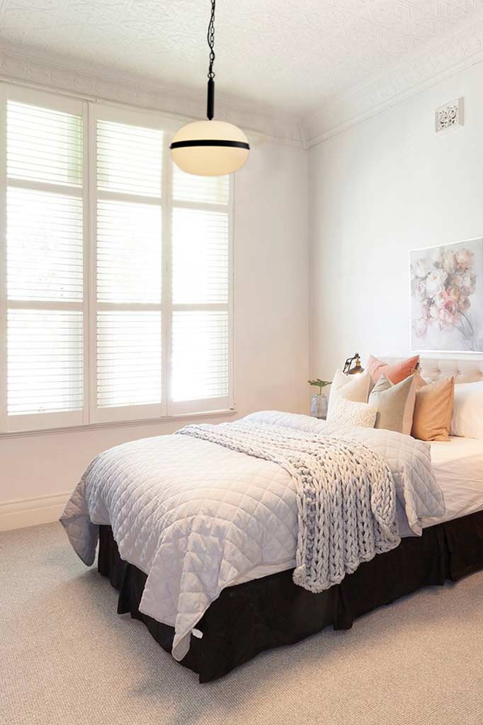 Opal glass pendant light in bedroom