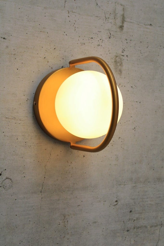 gold wall light in vertical 