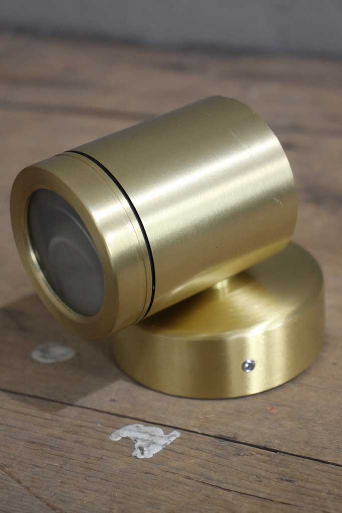 Outdoor LED spotlight with polished brass finish