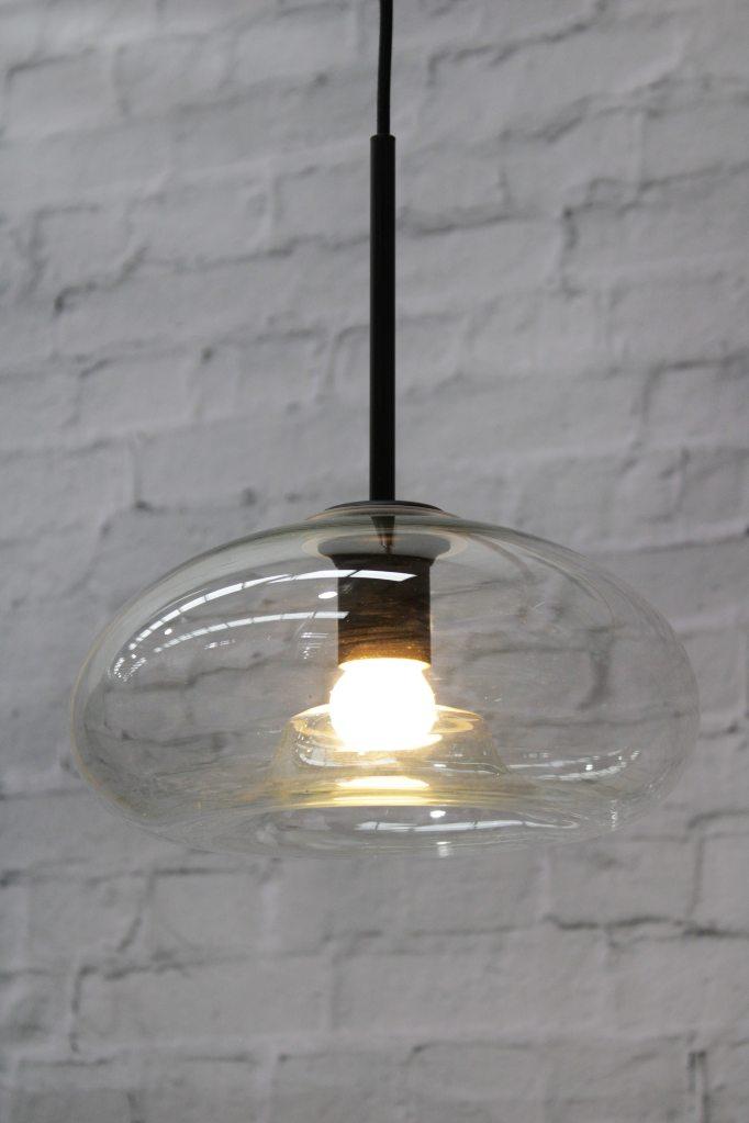 Oval glass pendant with black cord