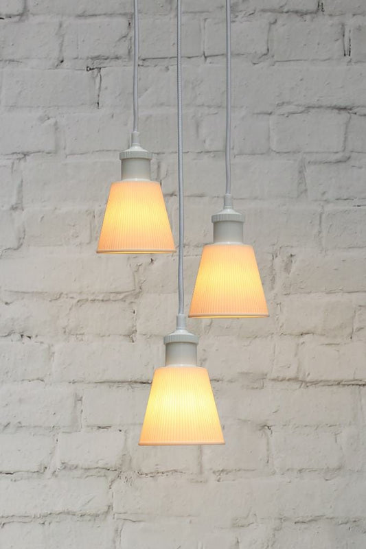 White three light pendant with large ceramic pendants