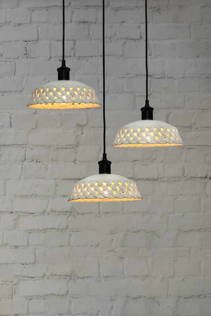 Black three light pendant with white ceramic shades