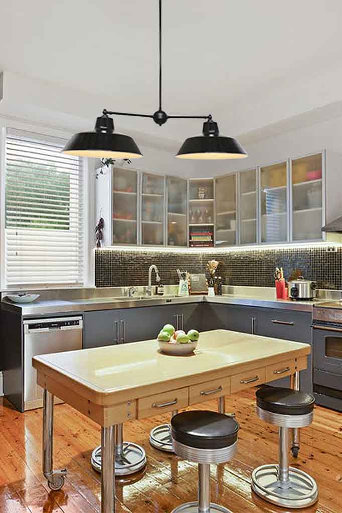 Enamel black steel pendant double light in kitchen.