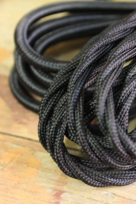 Twisted black fabric cord