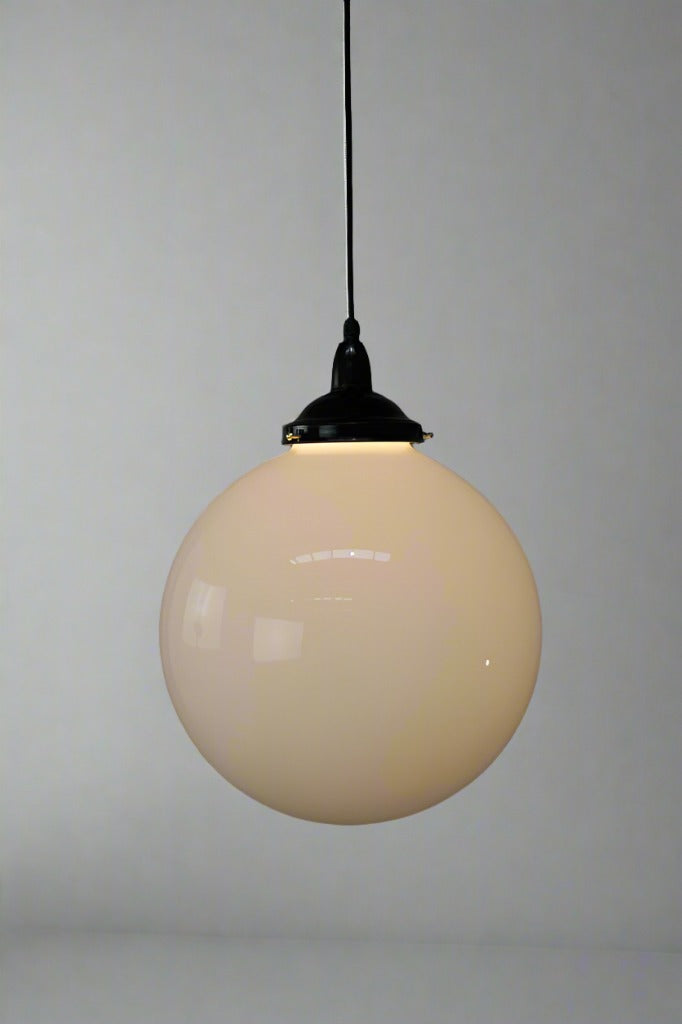 Pendant light with large opal shade