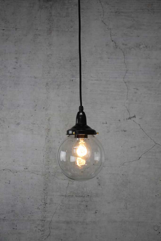 Pendant light with small clear shade