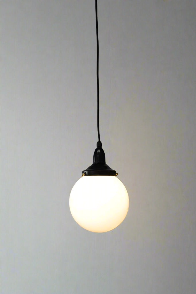 Pendant light with small opal shade