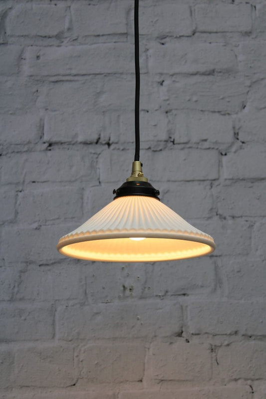 Pleat ceramic pendant light with gold/brass cord