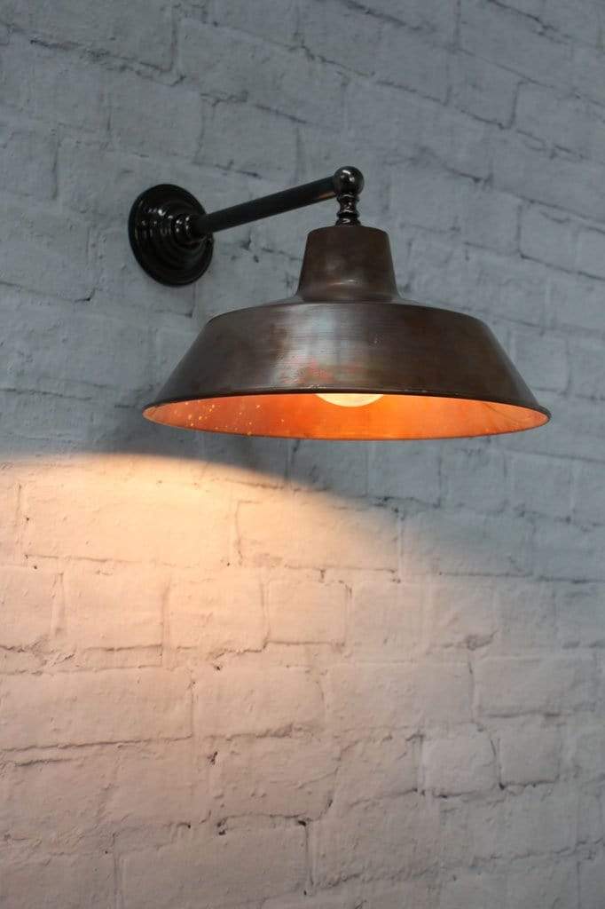 Copper wall lamp with brass arm sconce