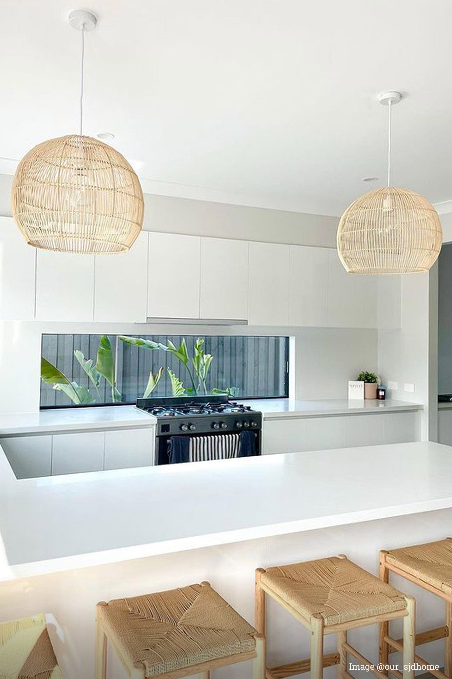 Meadowbrook Rattan Pendant Light in the interior of a house