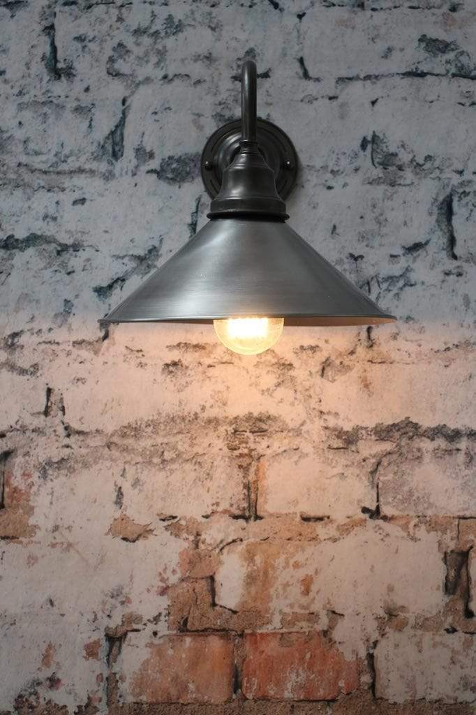 Raw steel outdoor wall light