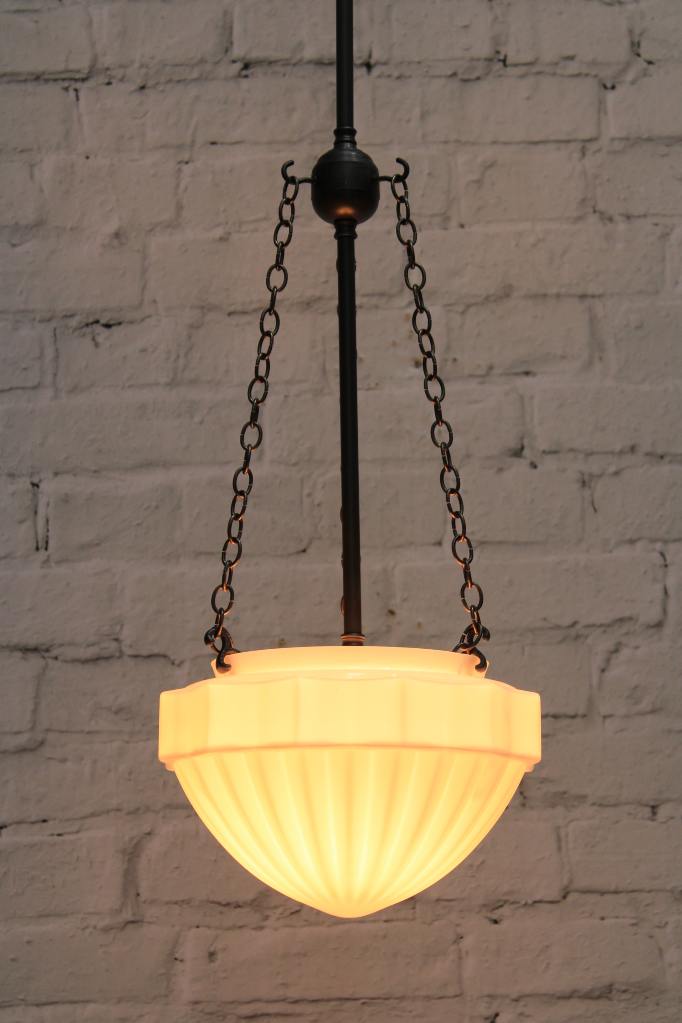 Riviera Chain Pendant in matt black finish with warm bulb