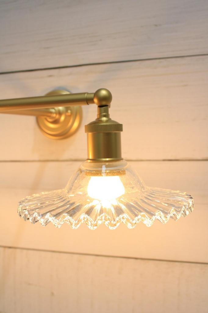 Scalloped glass shade with opal bulb