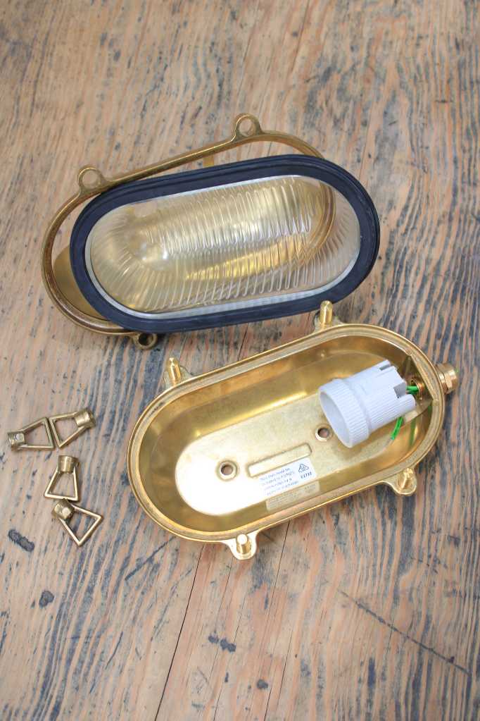 Secombe Brass Outdoor Bulkhead Lights eyelid open