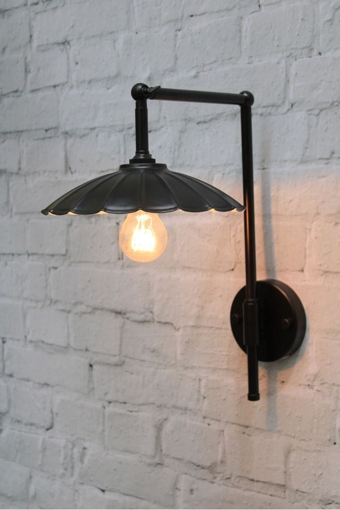 black wall light with umbrella shade