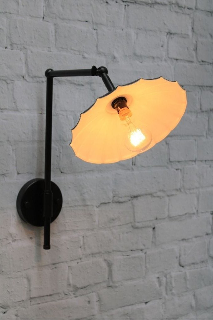 black wall light with umbrella shade