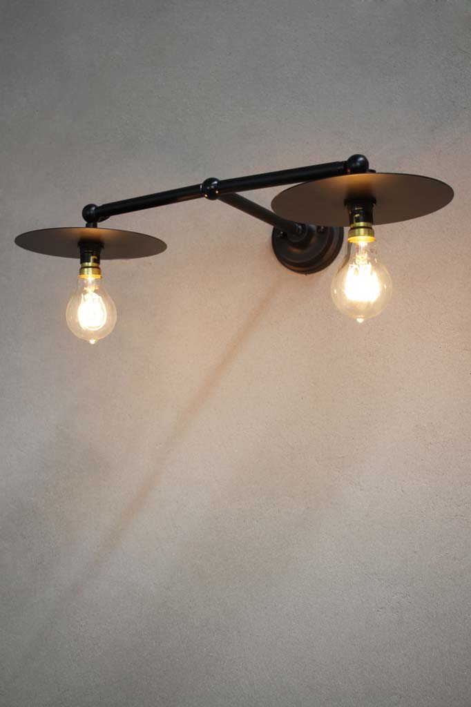 Black double arm disc wall light