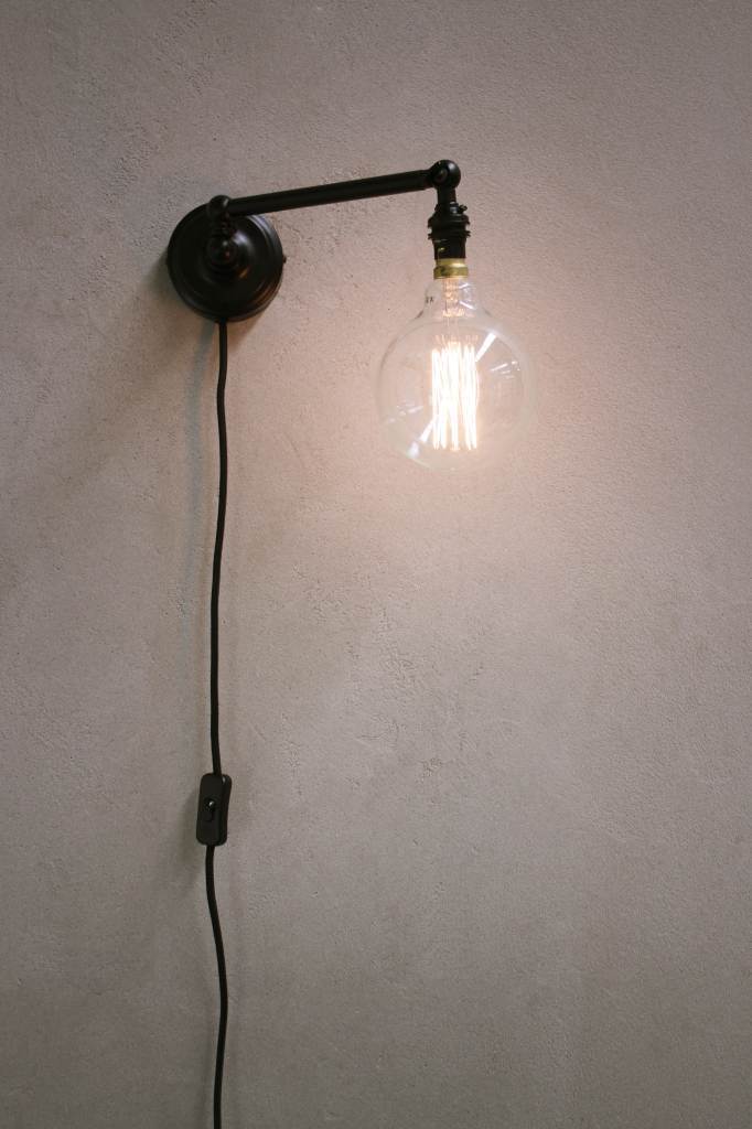 Swivel arm plug in wall sconce