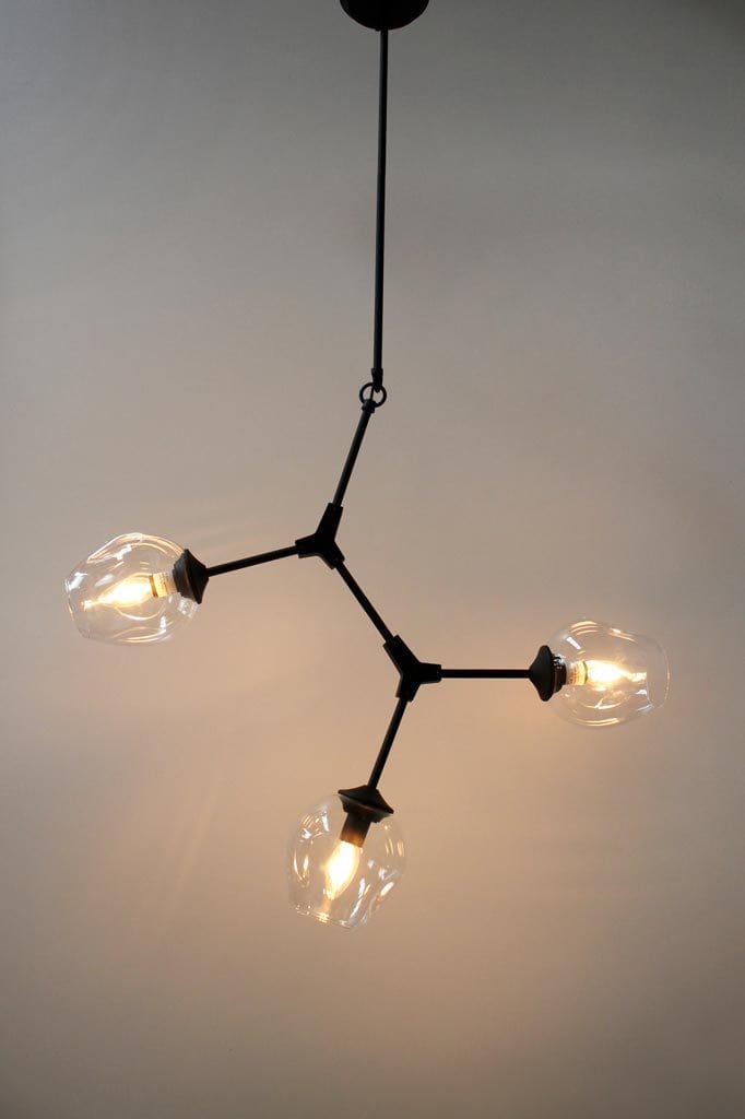 Three light chandelier spatial arrangement