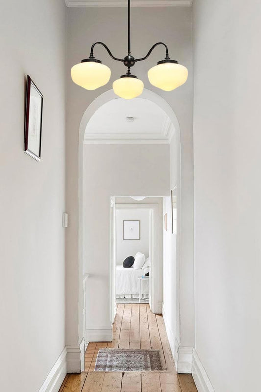 Washington Gooseneck Chandelier with Black Steel frame in hallway.