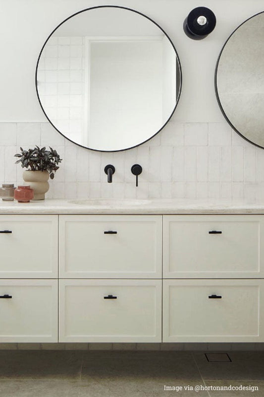 Baltic Wall Light over bathroom sink.