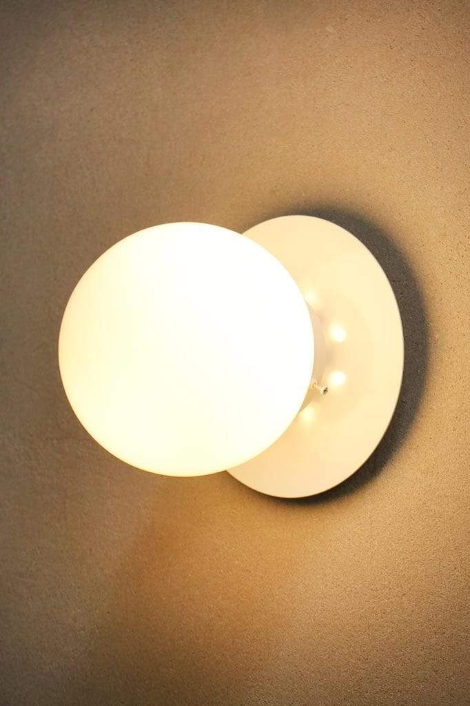 White disc with opal glass shade wall light