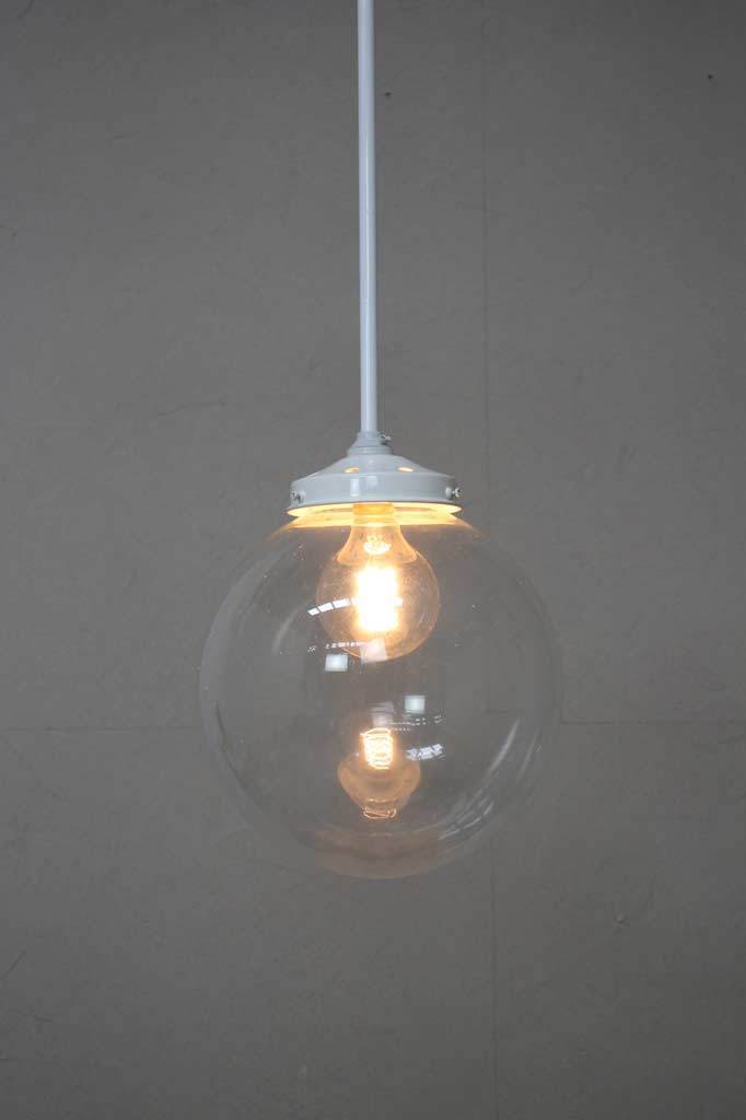 White pole pendant with medium clear shade