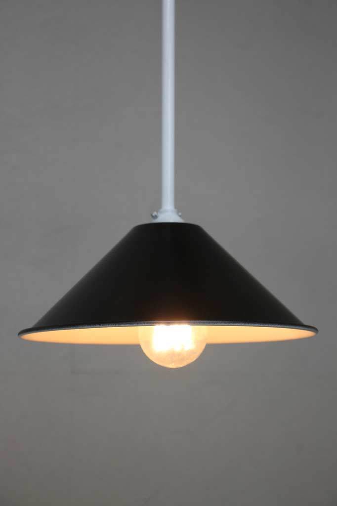 White pendant with black cone shade