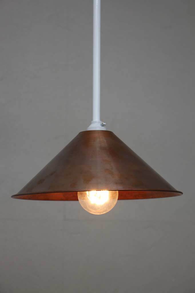 White pole pendant with copper cone shade