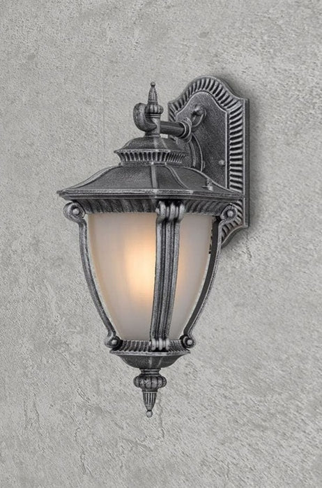 Outdoor wall light in antique silver finish. 