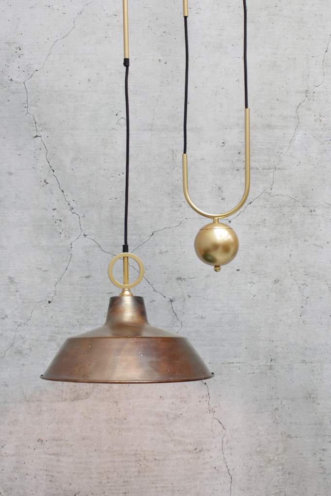 Aged copper factory shade with gold pulley