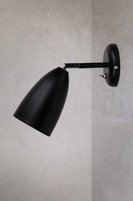 Tiltable wall light in black finish