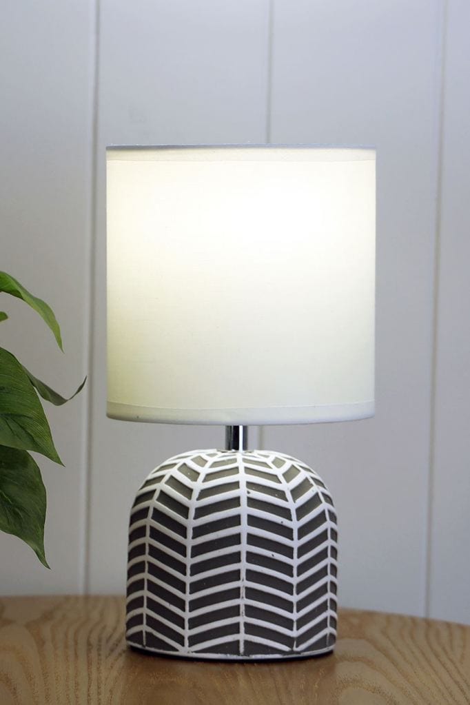 ceramic lamp with grey and white finish and white fabric shade