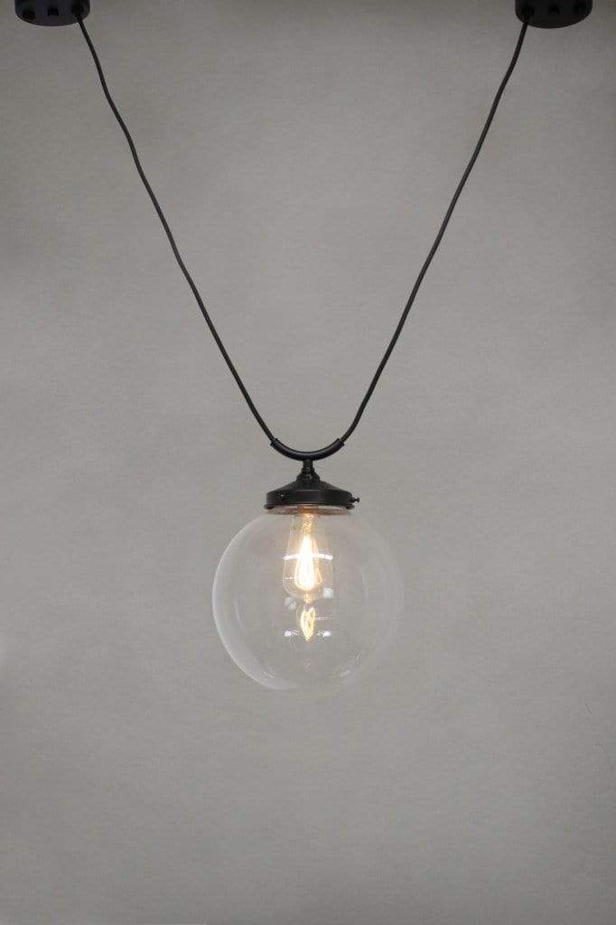 Medium round clear glass shade with trapeze pendant cord